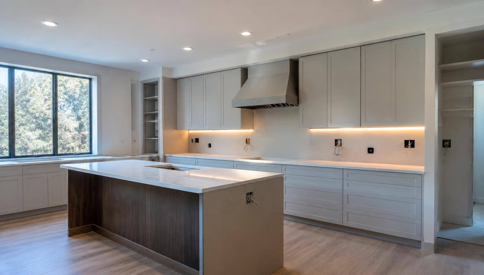 Kitchen remodel with new recessed and under-cabinet lighting and prepared outlet boxes
